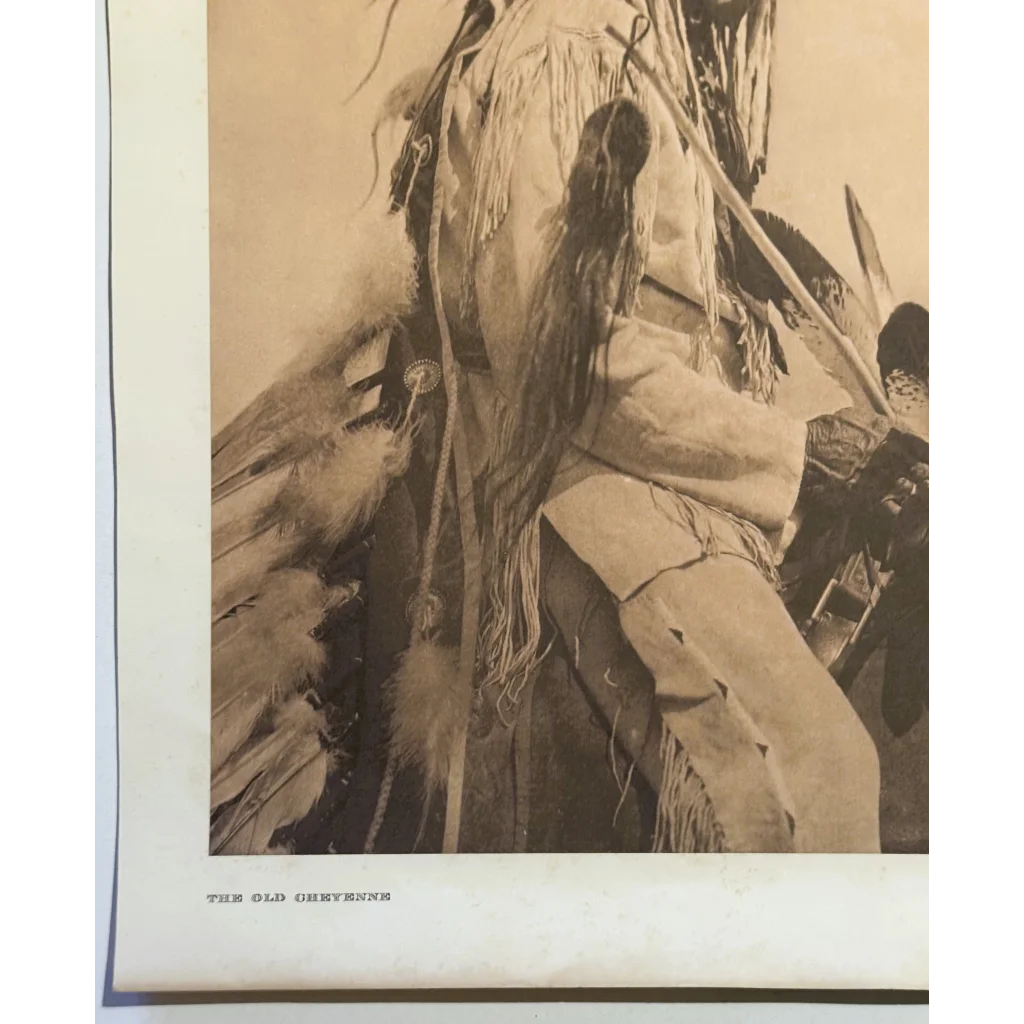 Sepia-toned Edward Sheriff Curtis photogravure of Cheyenne Native American in regalia