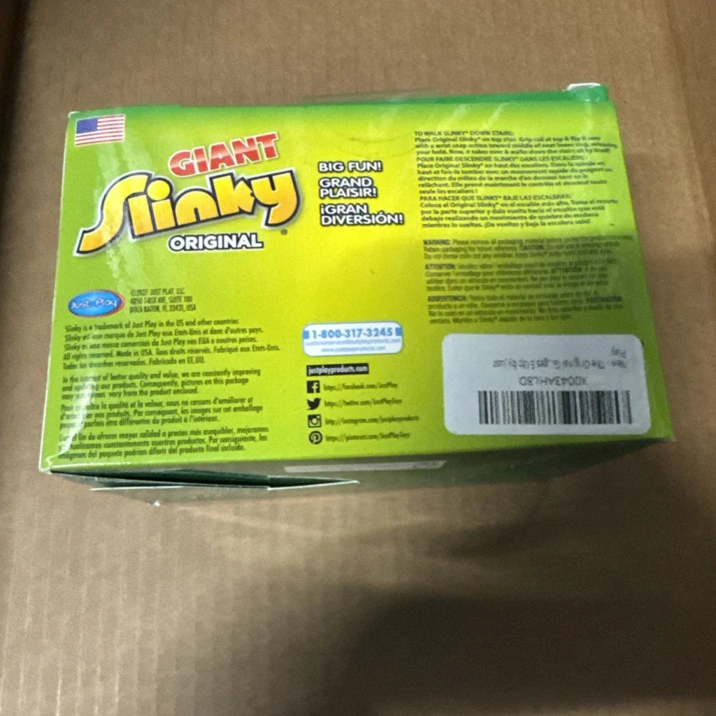 Green and yellow Original Giant Slinky walking spring toy box