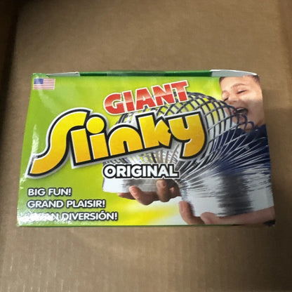Original Giant Slinky walking spring toy in green yellow packaging