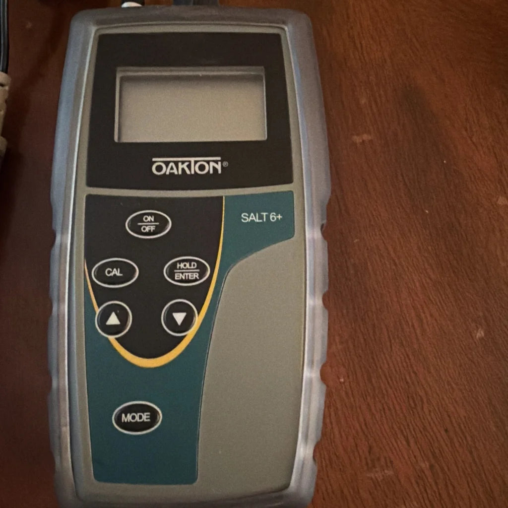 Oakton Salt 6+ handheld salinity meter with gray teal casing