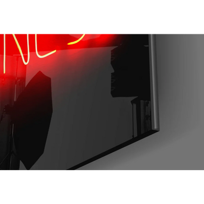 Sleek black TV reflecting Overthinking Kills Your Happiness red neon glass wall art