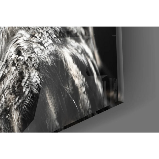 Stunning owl tempered glass art with vibrant orange eyes and wolf fur print