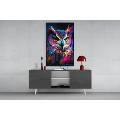 Vibrant glowing owl glass wall art with fiery orange eyes and neon multicolored feathers