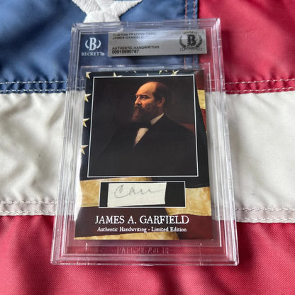 A framed beckett-certified custom trading card featuring an authentic piece of garfield’s handwriting