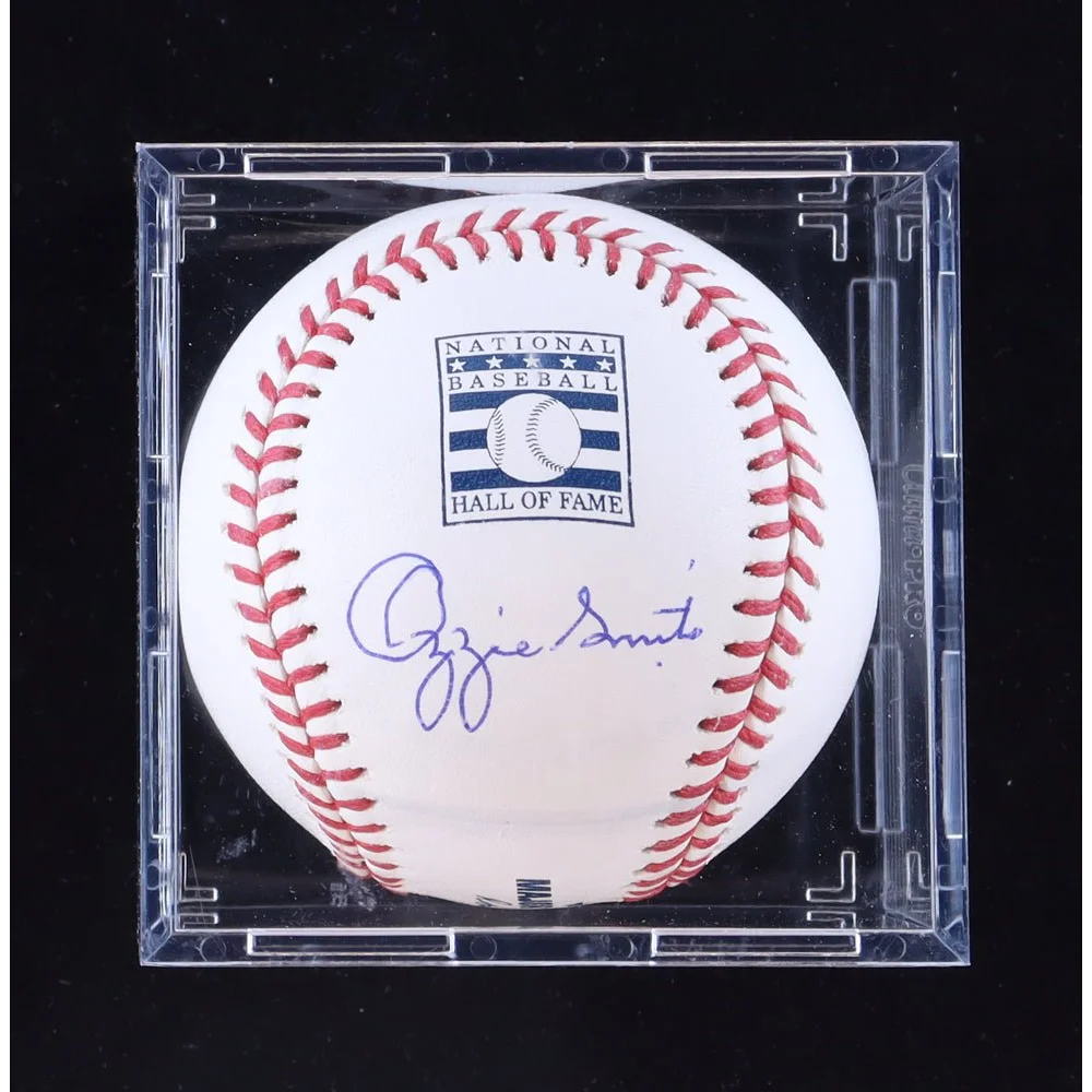 Ozzie Smith signed baseball in clear display case collectible