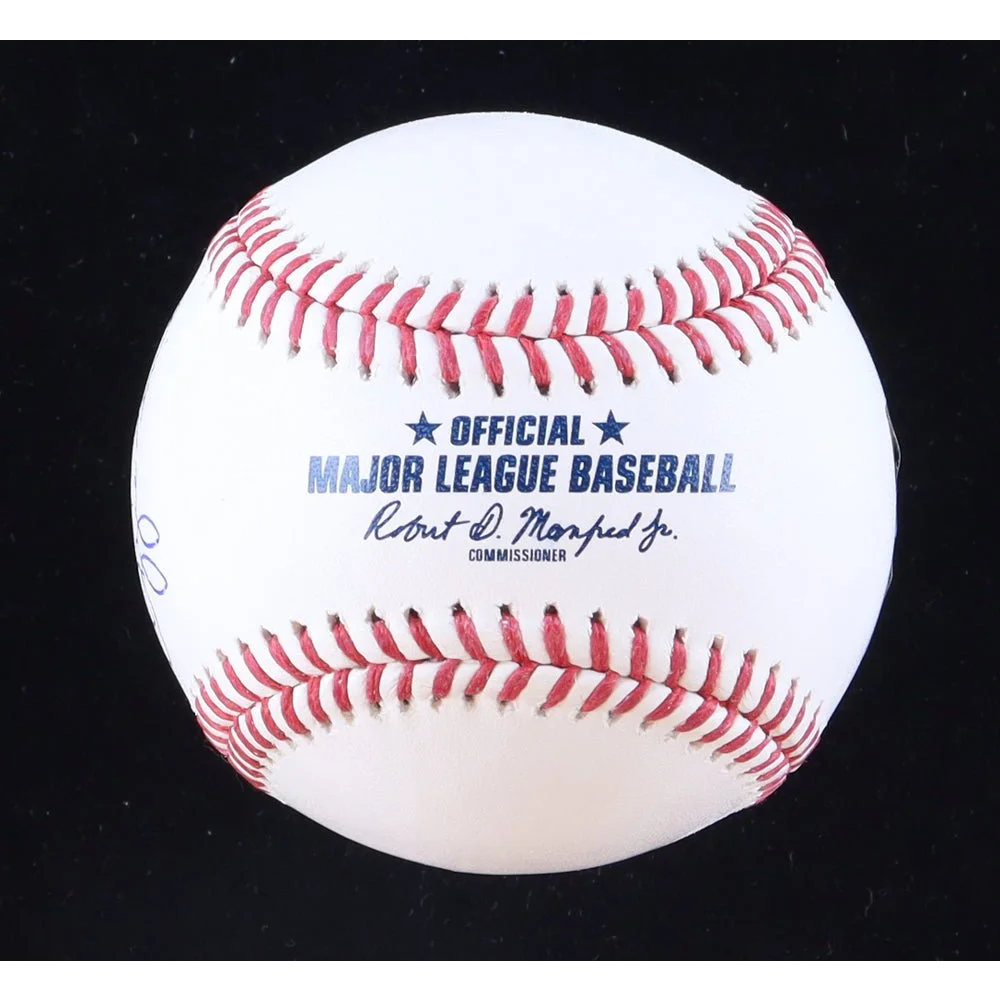 Ozzie Smith signed baseball with red stitching in display case collectible