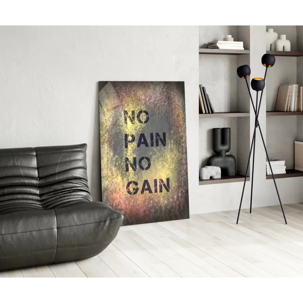 Black leather sofa with No Pain No Gain motivational wall art