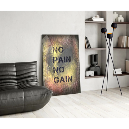 Black leather sofa with No Pain No Gain motivational wall art