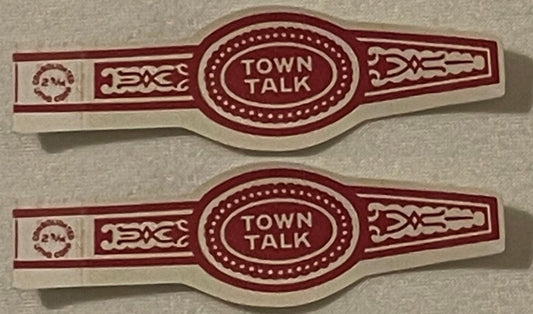 Two antique Town Talk cigar bands, one above the other: TOWN TALK in white in a beaded red oval, red scrollwork panels, and the small CONSOLIDATED LITHO CORP ring mark at the left end.