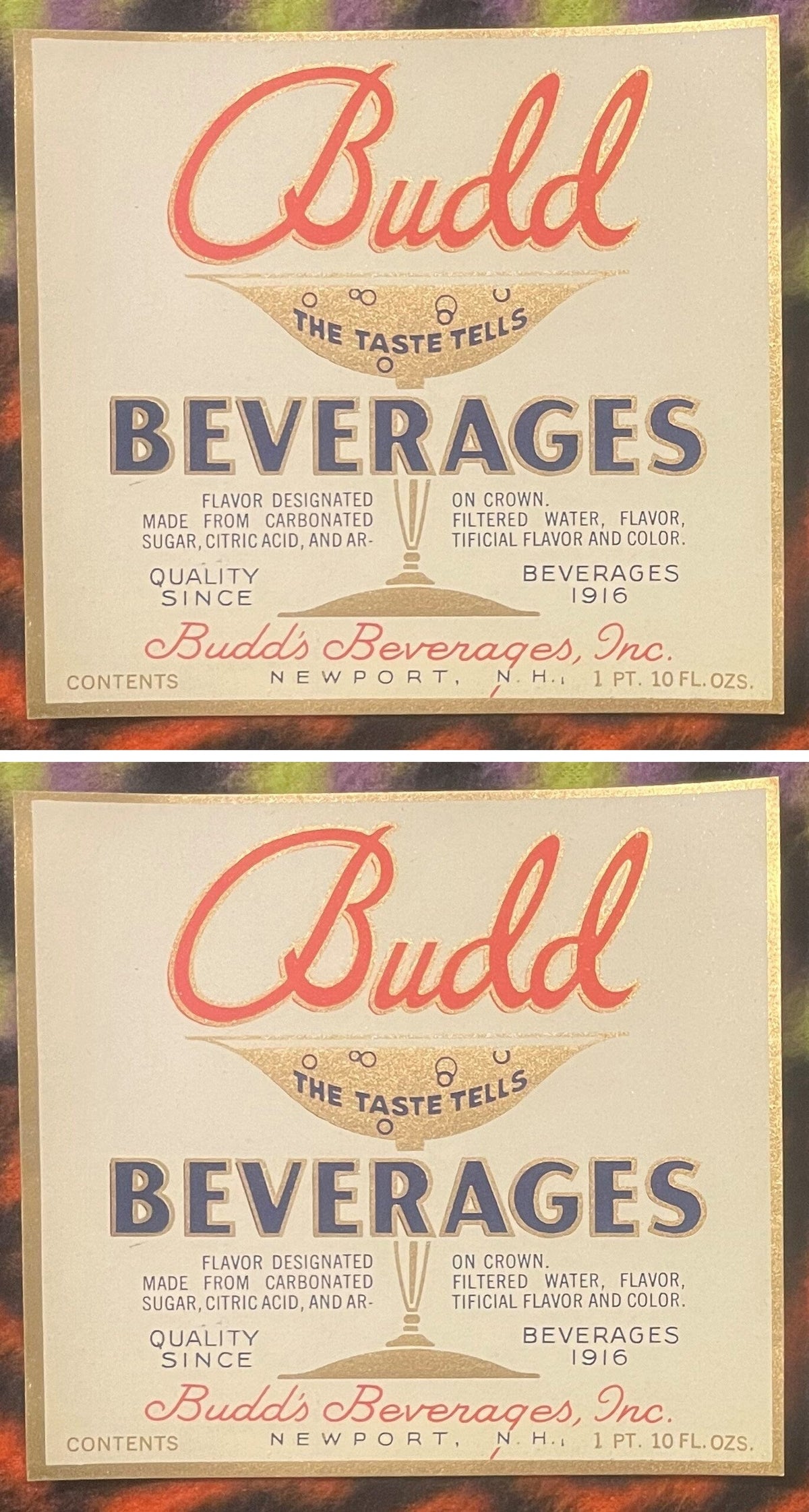 Two Budd Beverages labels, one above the other: red Budd script over a gold soda glass reading THE TASTE TELLS, navy BEVERAGES, flavor designated on crown, Budd's Beverages, Inc., Newport, N.H.
