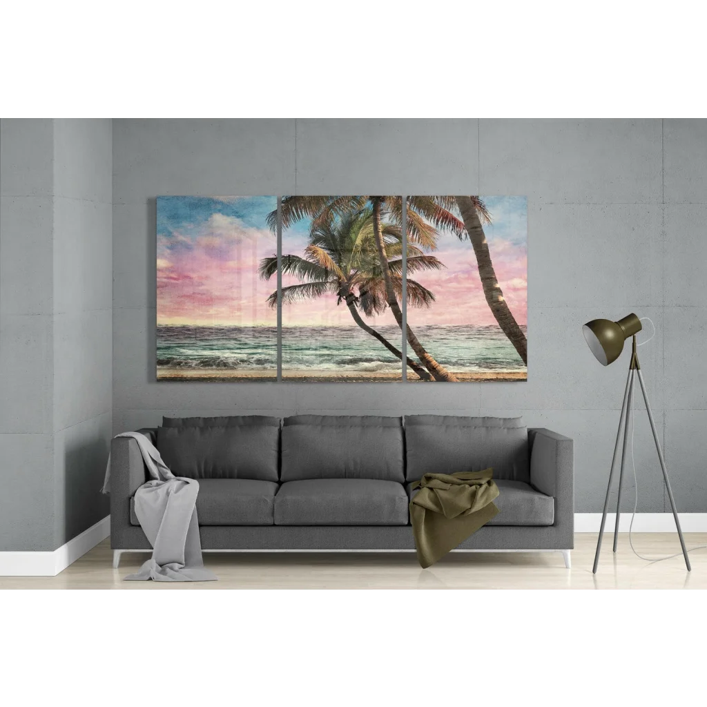 Tropical palm beach sunset triptych canvas wall art above gray sofa