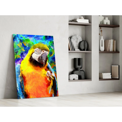 Vibrant yellow and blue macaw glass wall art on canvas