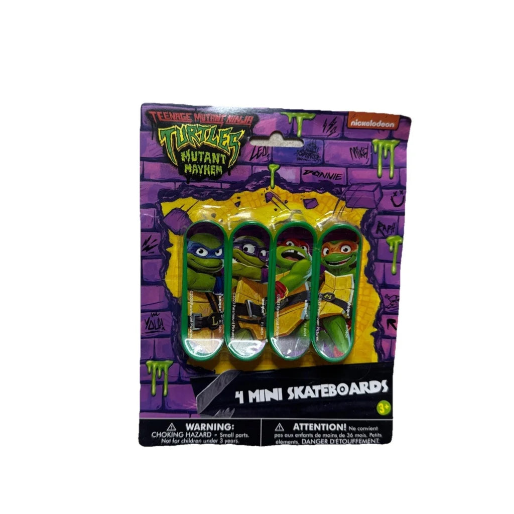 TMNT party favors: 4 green Ninja Turtles mini skateboards in purple yellow pack