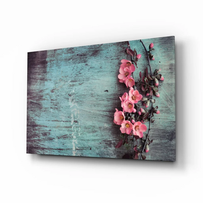 Vibrant pink blossoms on teal wood canvas wall art print