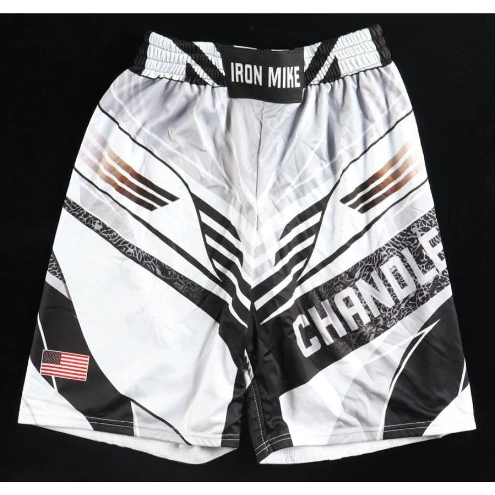 White and black MMA shorts with American flag patch for patriotic fighters
