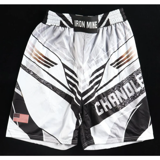 White and black MMA shorts with American flag patch for patriotic fighters