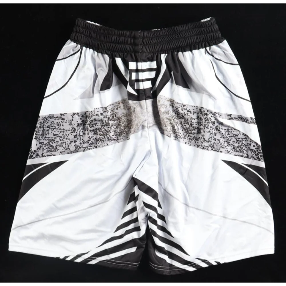 Black and white patterned athletic shorts with elastic waistband and American Flag patch
