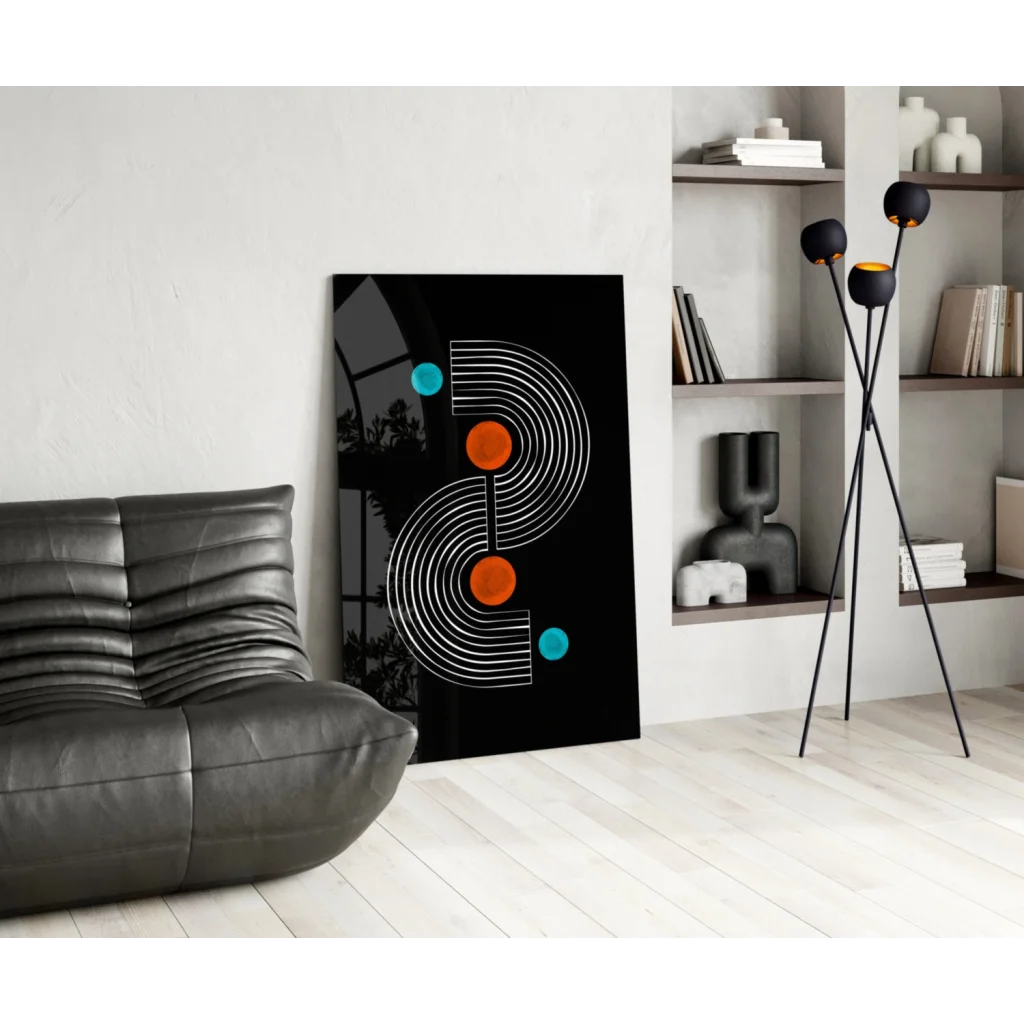 Black modern glass wall art with white concentric lines, orange teal circles