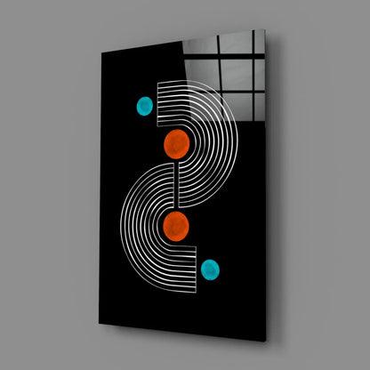 Modern black glass wall art with white arcs, orange circles, teal dots