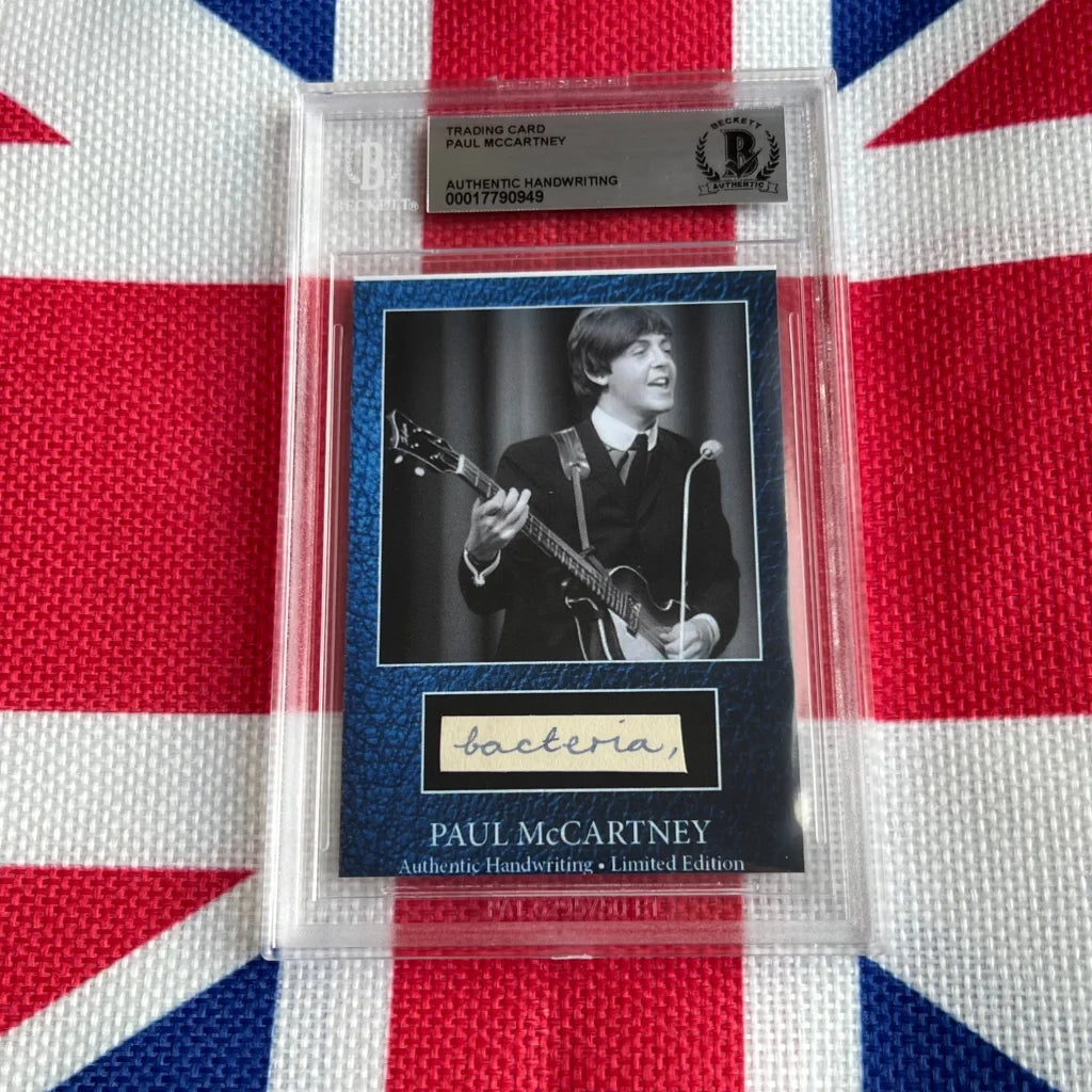 Paul McCartney autographed trading card with guitar photo on blue background