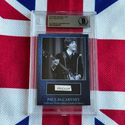 Black and white paul mccartney trading card playing guitar with original handwriting autograph in clear protective slab