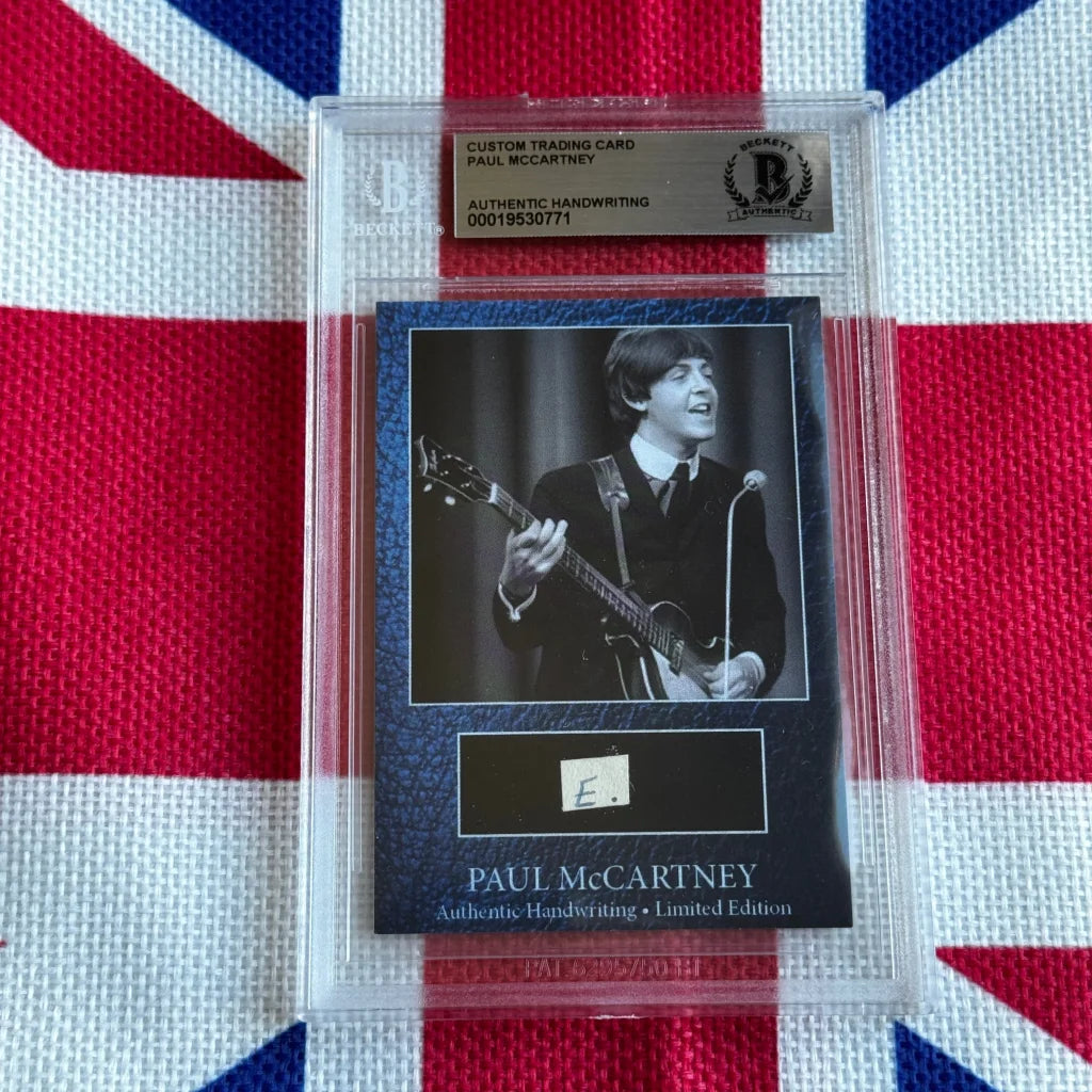 Black and white paul mccartney guitar trading card with original handwriting autograph in protective slab highlighting music history and rock n roll