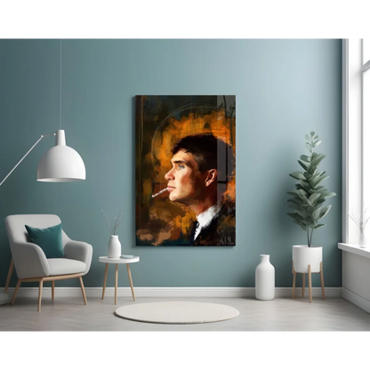Framed glass wall art of man in profile with bold orange brown abstract tones