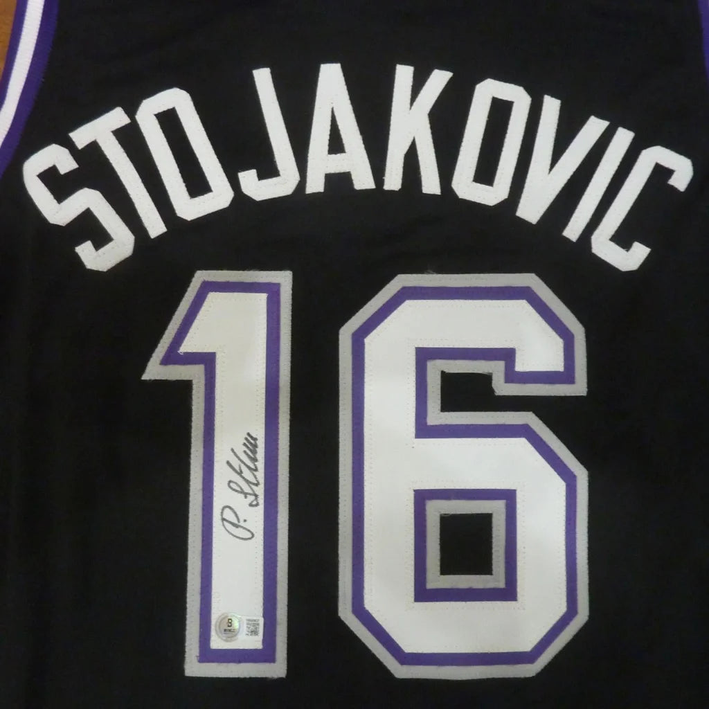 Peja Stojakovic autographed black Sacramento Kings jersey number 16