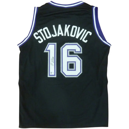 Peja Stojakovic autographed Sacramento Kings black jersey number 16