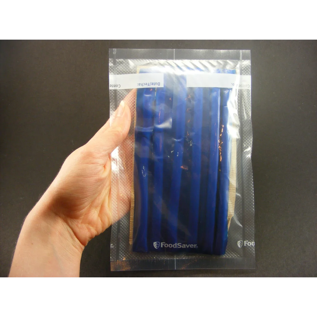 Blue FoodSaver pouch in perfect display putty for crystals