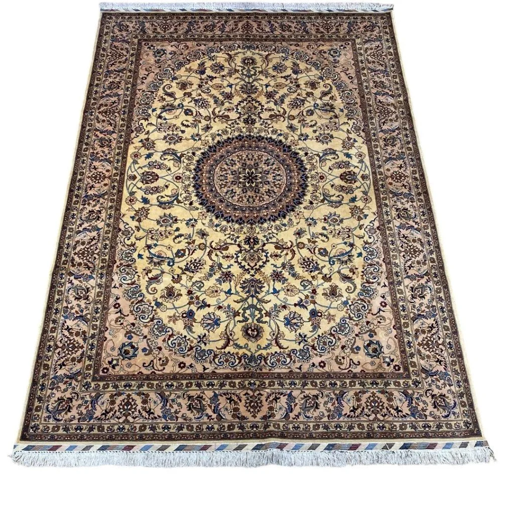 Cream-colored Persian rug set break with ornate floral medallion
