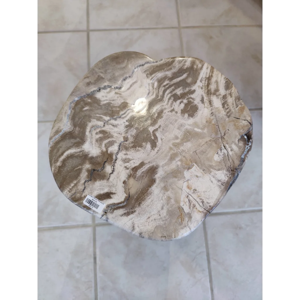 Petrified wood pedestal side table with smooth beige-gray swirling patterns