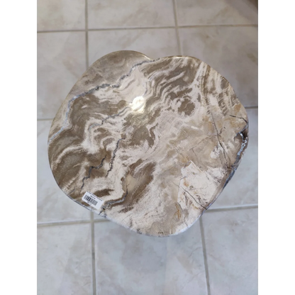 Petrified wood pedestal side table with smooth beige-gray swirling patterns