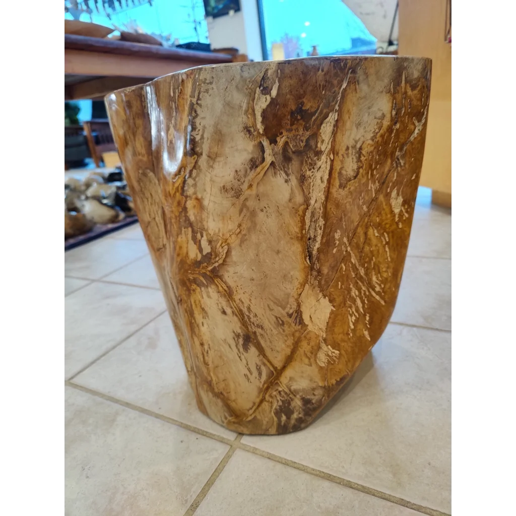 Rustic petrified wood pedestal side table with amber brown marbled finish