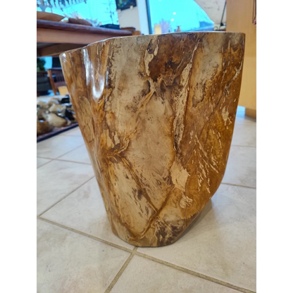 Rustic petrified wood pedestal side table with amber brown marbled finish