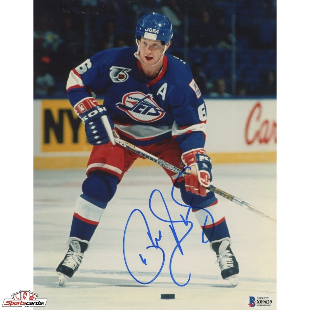 Phil Housley signed 8x10 photo with hockey stick grip and blade