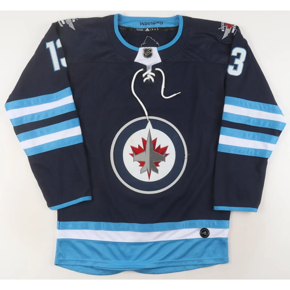 Winnipeg Jets navy blue hockey jersey with white and light blue stripes signed by Pierre-Luc Dubois