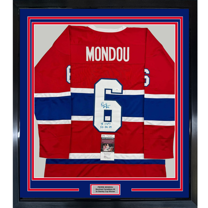 Framed Montreal Canadiens red, white, and blue hockey jersey number 6 signed by Pierre Mondou with Stanley Cup inscription, displayed front-facing with JSA authentication certificate.