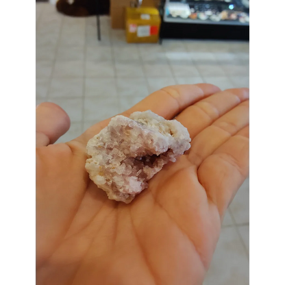 Pink amethyst (MD) specimen with pale crystalline, jagged surface and pink hues