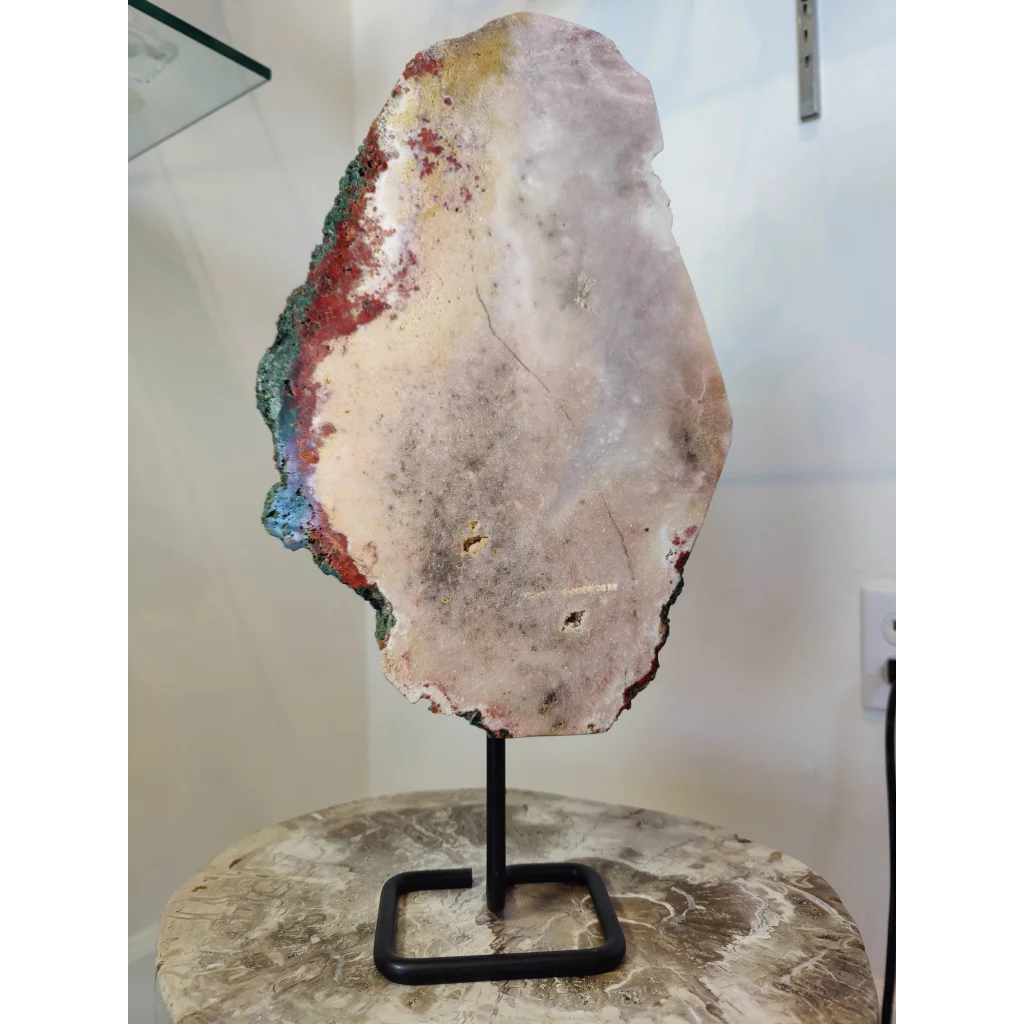 Pink amethyst polished slab sculpture with pale pink interior and vibrant mineral veins on metal display stand 3.11kg