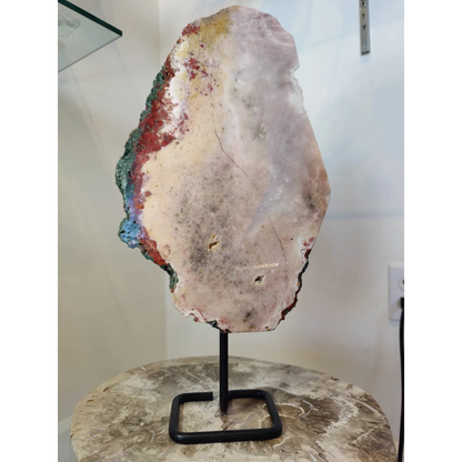 Pink amethyst polished slab sculpture with pale pink interior and vibrant mineral veins on metal display stand 3.11kg