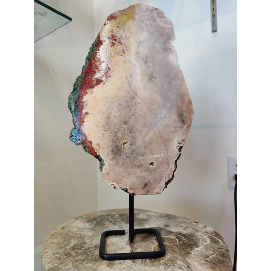 Pink amethyst polished slab sculpture with pale pink interior and vibrant mineral veins on metal display stand 3.11kg