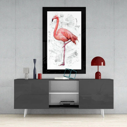 Pink Flamingo glass wall art in sleek black frame on modern gray sideboard