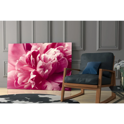 Vibrant pink peony wall art canvas print with glossy petals on gray wall
