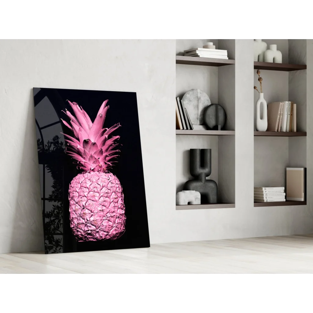 Vibrant pink pineapple glass wall art on black canvas against white wall