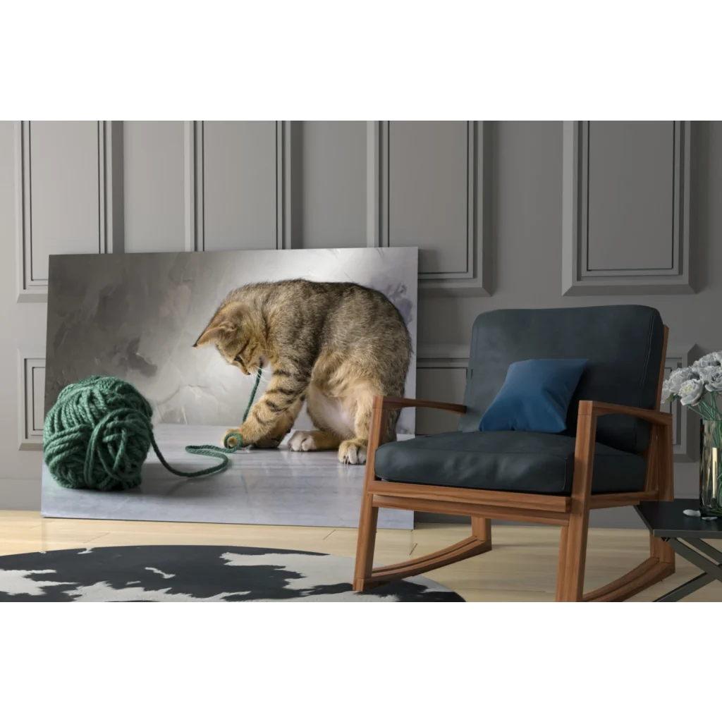 Playful tabby kitten with yarn ball canvas wall art print