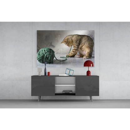 Tabby cat playing with yarn ball canvas wall art