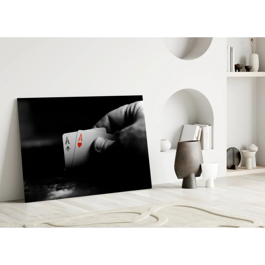 Black-and-white hand holding two aces canvas wall art with red heart pop