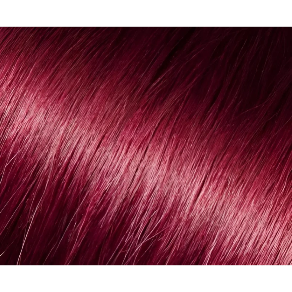 Lustrous deep red human hair tape in extensions with subtle lighter highlights