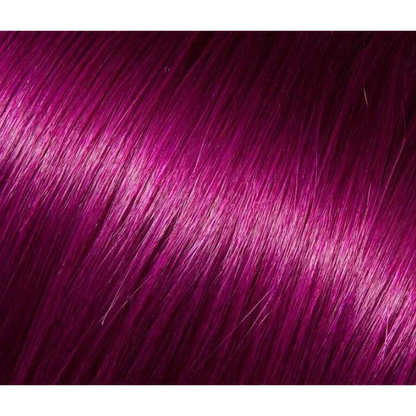 Vibrant magenta human hair extensions with a shiny lustrous finish for a bold look